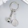 Breek Metal "Game of tennis - rocket and ball" silver 7x2.5 cm