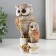 Polystone souvenir "Gray eagle owl with brown wings, with a stump of hemp" 16.8x9.5x5 cm