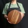 Groot board with a metal handle, round, 35.8 × 25 × 1.6 cm, tropical acacia