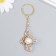 Breek Metal "Cross" Pearl, gold 5x4 cm