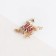 Brooch "Frog" traveler, red color in gold
