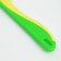A comb for wool 15.6 x 3.6 cm, short teeth 1.7 cm, green-yellow