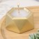 Candle "Hexagon. Marble" in the candlestick of gypsum is small, 7x3.5cm, gold