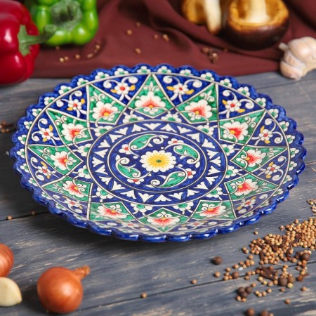 Plate of the Rishtan ceramics "Flowers", blue, embossed, 25 cm