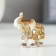 Polystone souvenir "White elephant with a blade of Arab carpet" mix 5.5x5x2.2 cm