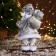 Santa Claus "in a suit with sequins and with a flashlight" 30 cm, silver