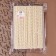 Knitted lace, 15 mm × 15 ± 1 m, beige color