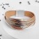 Bracelet Skin "on the magnet" continuous lines with an arc, white-beige color, 18.5 cm