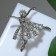 Brooch "Ballerina" with beads, white color in silver