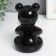 Souvenir ceramics stand "Bear with white flower" black 7x9x10.5 cm