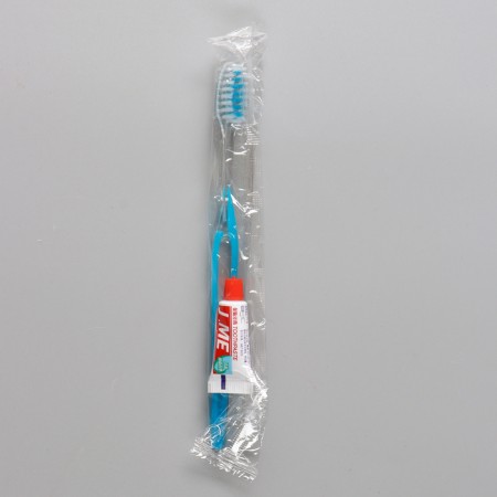Dental set in a bag: a toothbrush 18 cm + toothpaste 3 g-1