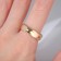 Ring "crumpled lines" solo, color gold, dimensionless