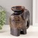 Ceramics candlestick on 1 candle "Elephant. Ethnic patterns" Brown 10x14.5x18 cm