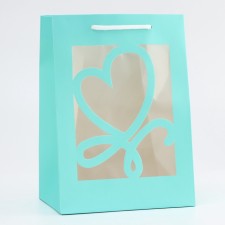 Gift package with a curly window, 18 x 13 x 25 cm, blue