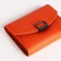 Women's wallet on the button, orange color
