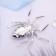 Brooch "Spider", white-blue color in silver