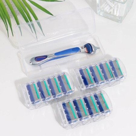 The machine is a razor and 12 interchangeable cassettes of blades, compatible with Gillette Fusion-1