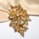 Brooch "Empress" dew, blue color in gold