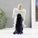 Souvenir porcelain angel with a cobalt drum 20cm