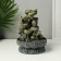 The desktop fountain from the Buddha with Flower Waterfall network is gray 20.5x20.5x27 cm