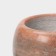 A mortar with a “marble” push, made of natural stone, brown color