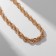 The necklace "chain" is twisted, the color is gold, 40 cm
