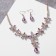 Set 2 objects: earrings, necklace "magnificent eyelids" flowers, pink color in gold, 42 cm