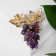 Brooch "Amethyst" grapes, mobile beads, green-violet color in gold
