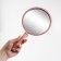 Mirror with a handle, D mirror surface 12 cm, pink color