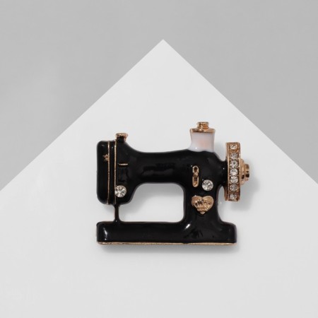 Brooch "Sewing Machine" with a hoe of threads, black and white color in gold