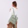 City backpack on a zipper, green color