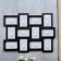 Photo frame "Geometry" black in 12 photos 10x15 cm (57x44 cm)