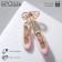 Brooch "Poins" ballerina, white-pink color in gold
