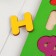 The frame “Alphabet 1” is painted, mix