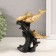 Polystone souvenir "Three dolphins on the wave, with patterns" gold 14x7x17.5 cm