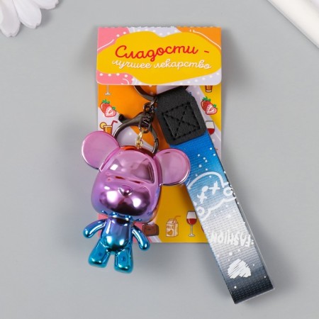 A plastic keychain with a carbine, a strap "Bear" holography 4x5.3x6.5 cm