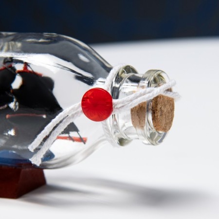 Souvenir ship in a bottle 15x4x6cm, black-3