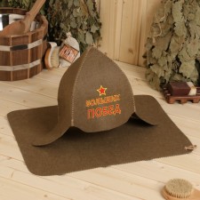 Set for the bath: the hat and rug of 