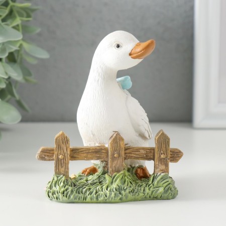 Polystone souvenir "Gusenok with a blue bow at the fence" 9x8x10 cm-3