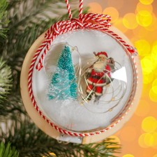 New Year's ball with a wooden figure and backlight 