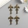 Metal hook "Heraldic lily" bronze 4.6x2.5x1 cm
