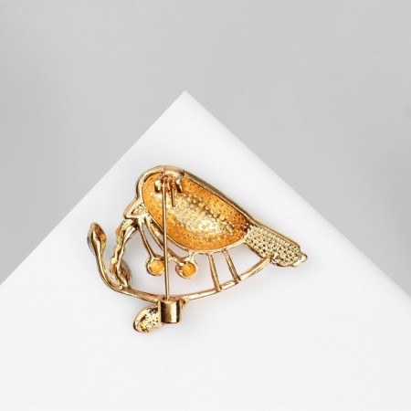 Brooch "Bird" with berries, colored in gold-1