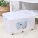 Storage container with a lid Ricco, 50 l, 61 × 39 × 32 cm, on wheels, color transparent color
