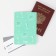 The cover for the passport "Born to spend, cannot save"