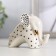 Souvenir Ceramics "Elephant with a zigzag on the ears" white-black with gold 7x4.2x9.8 cm