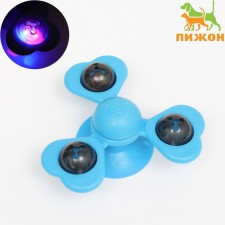 Toy-wound on a suction cup for cats 