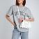 Youth bag with a zipper, white color
