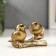 Polystone souvenir "Two golden sparks on a branch" 6.5x11x5.5 cm