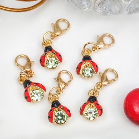 Charm "God's ladybug" of a crumb, color in gold-1