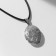 Pendant on the lace "for photo" oval with flowers, color silver on a black lace, 45 cm